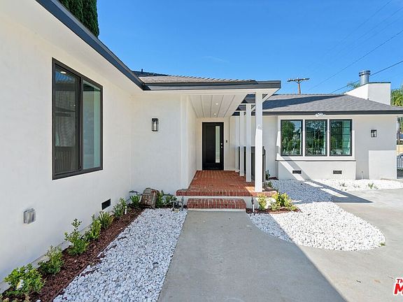3rd image of 4955 Woodman Ave