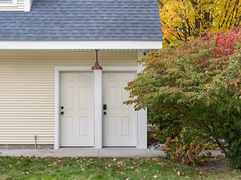Your private entrance on the right, and your garage parking on the left. Amazing in a downtown location!