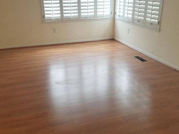 living room (open to dining area continuing at left)