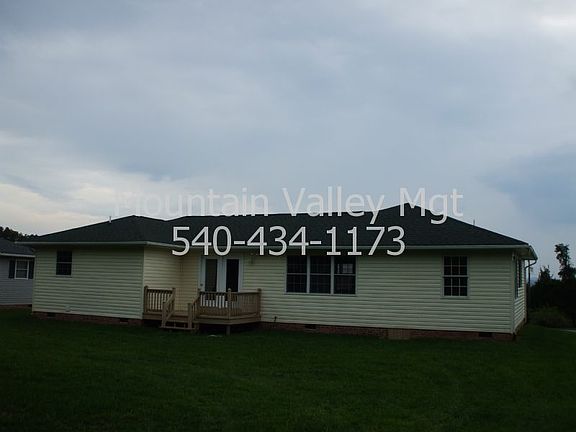 Rear view of home & rear yard
