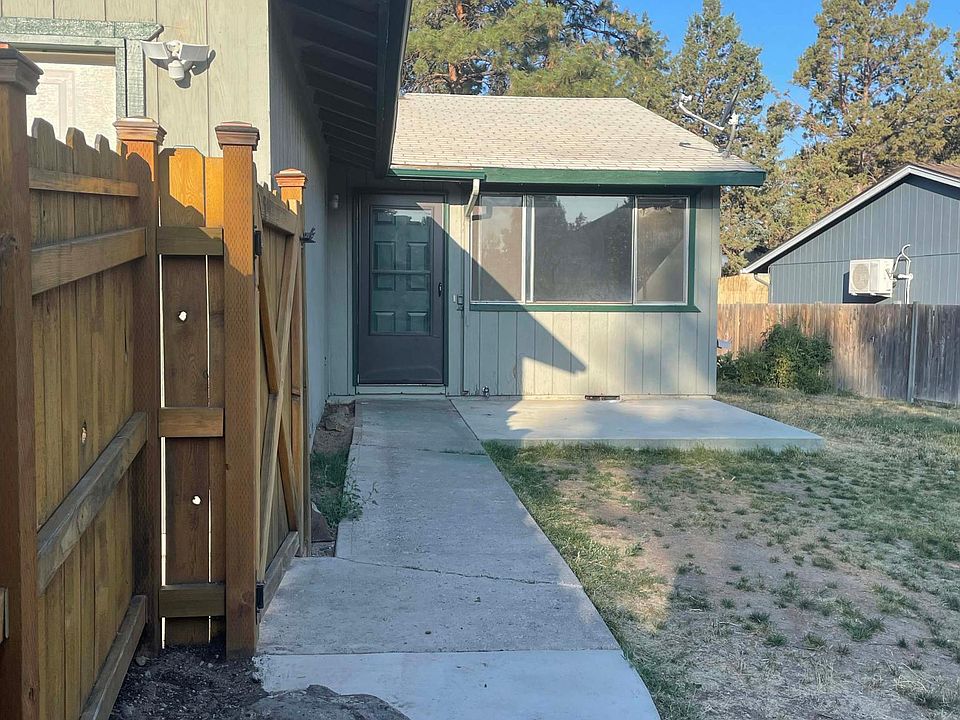 Large front yard with lots of room, concrete patio, room for flower beds or raised gardens (with landlord approval!)