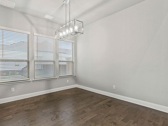 Dining room in the Waldorf home plan by Trophy Signature Homes