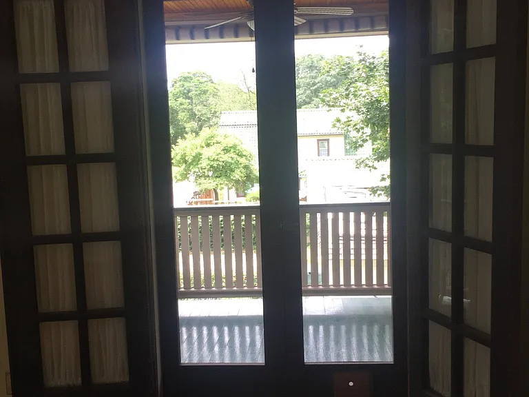 View of French doors out to back porch