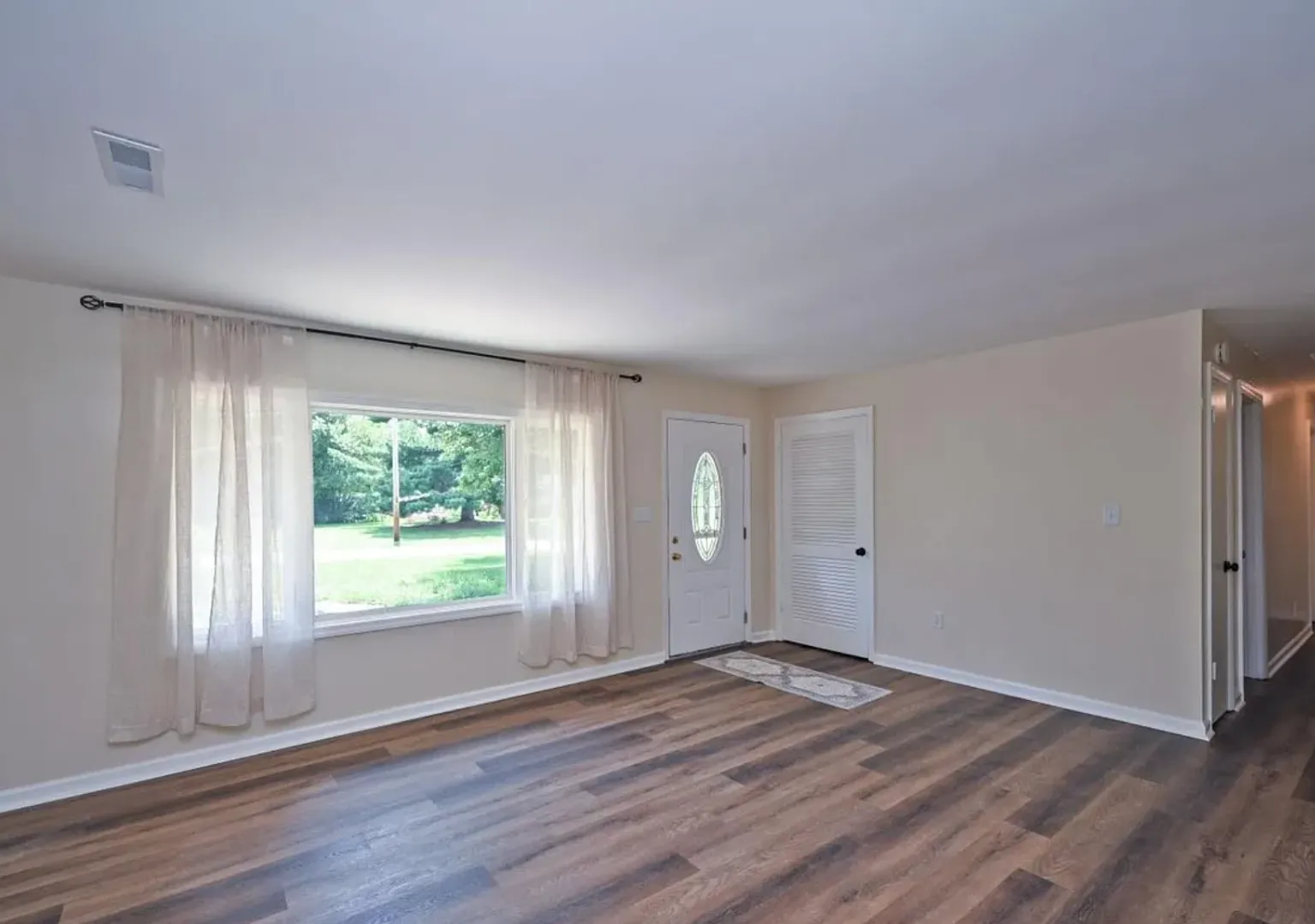 Brand-New 4-Bed Milford Home with Sunroom, Large Backyard & Patio — Photo 2