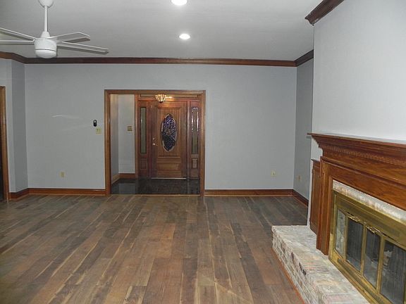 Den with Large Fire Place