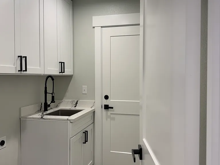 Laundry room with utility sink