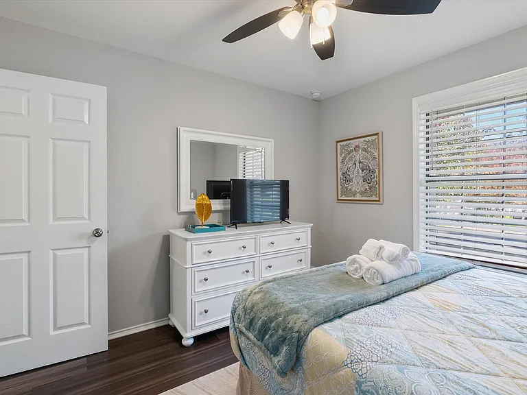 Secondary Bedroom Queen Plush Bed Full sized Dresser with Mirror and large walk in closet