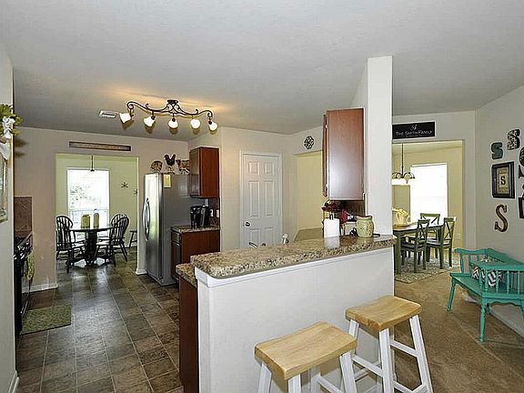 Once you are in, the kitchen bar is around the corner.