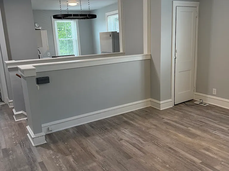 Living room looking into kitchen