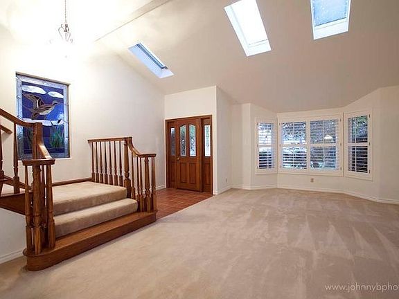 Living Room + Stairs to Second Floor