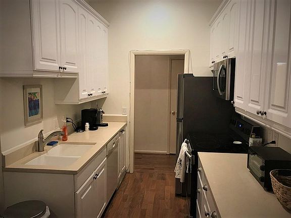 Kitchen with new appliances/ hardwood floors