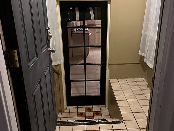 The dedicated arctic entry is nicely tiled and provides a place to keep shoes, coats, etc.