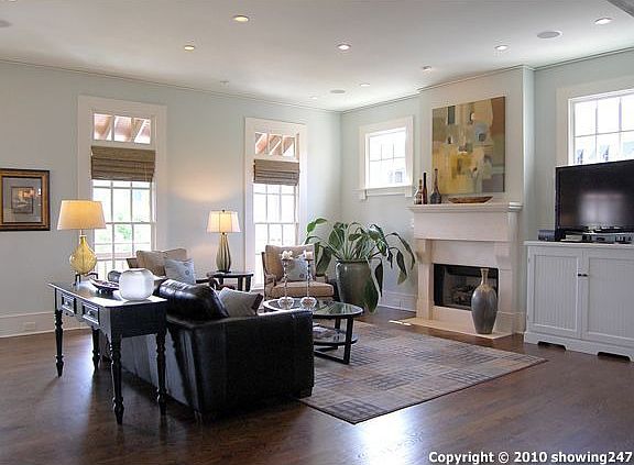 Spacous, light-filled living room with Texas limestone hearth & surround.