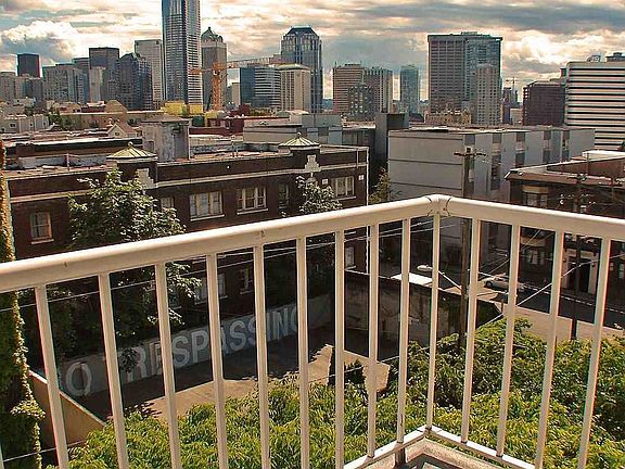 Private deck off living room.