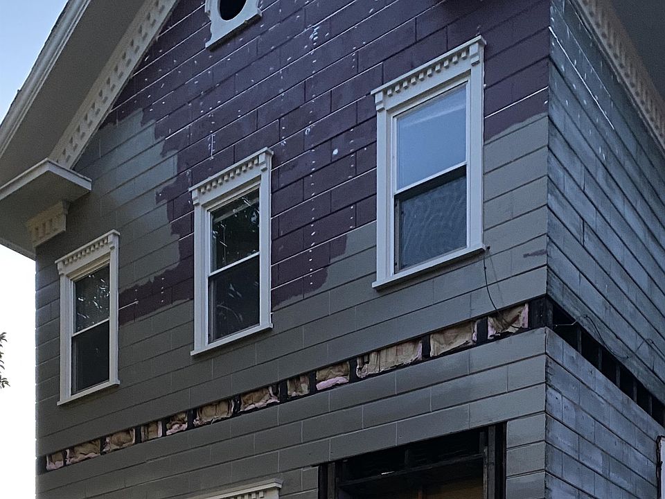 Exterior renovations include new porch, new paint and new exterior front door (not pictured).