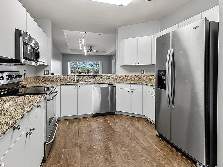 7827 Regal Heron Cir #306 — Photo 1