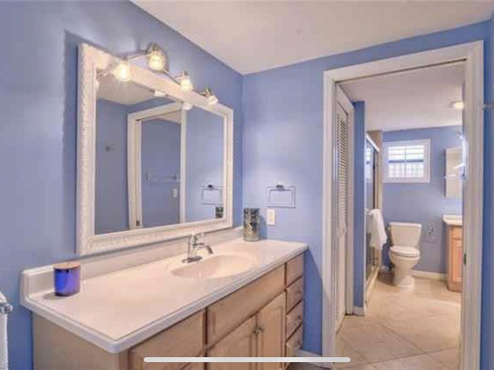 Bathroom has 2 vanities, this is across from walk in closet