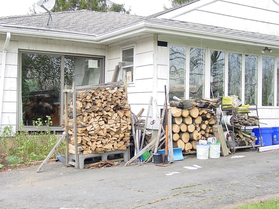 Sun Porch and wood pile