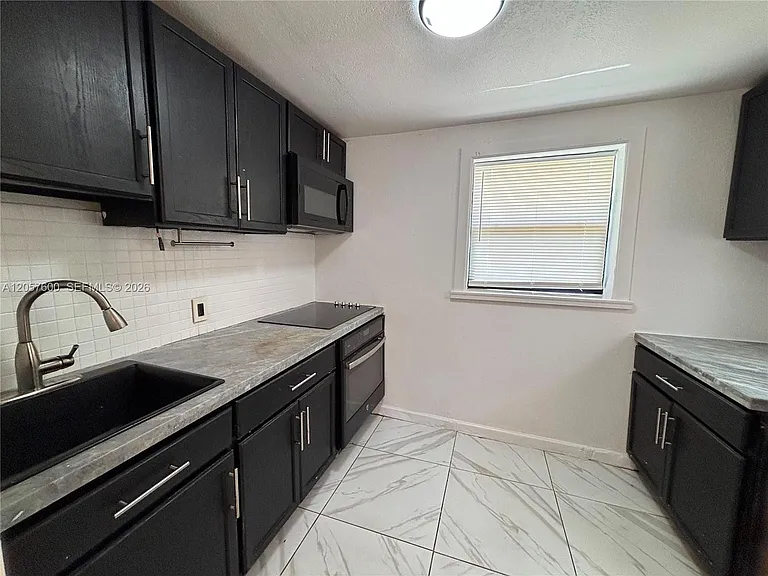 1079 NW 112th Ter #3 — Photo 5