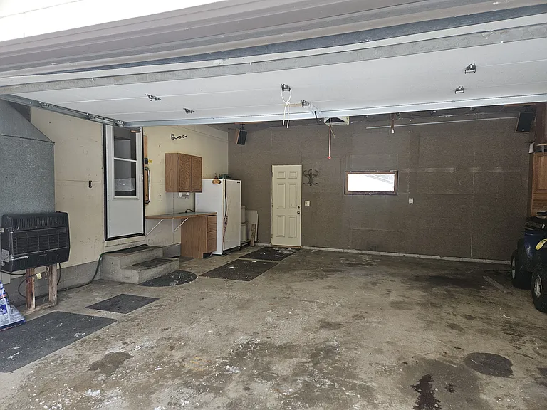 2 car garage with door into kitchen