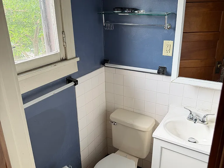 Half Bath off the living room (with washer & dryer)