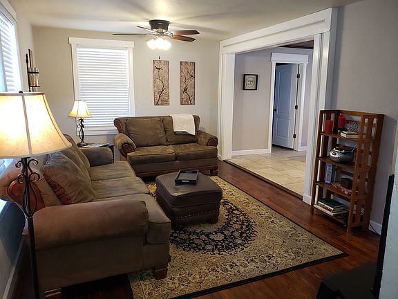 Living room with refinished original hardwood floors.
