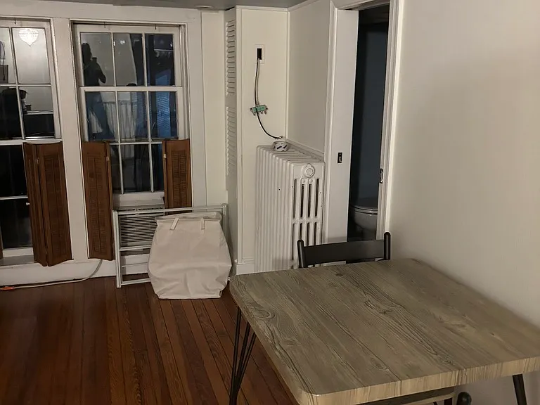 sitting or breakfast room. Door that you see on the right is to the private bathroom