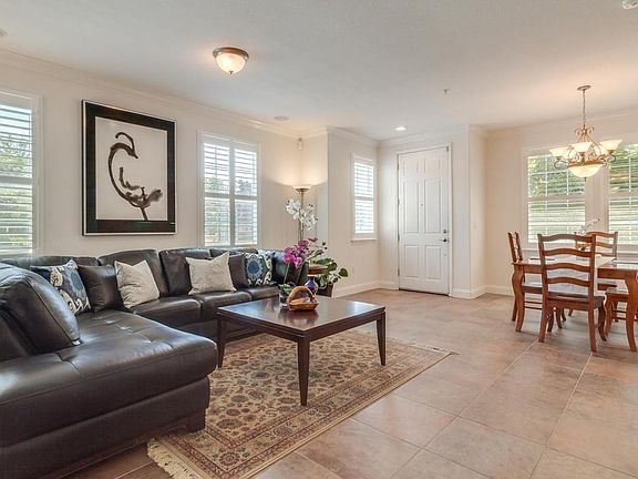living room from stairs and garage