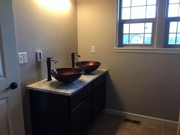 Master bathroom with walk in closet and heated tiles!