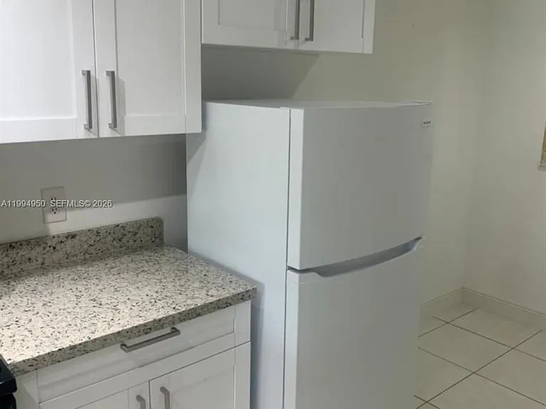 7435 Woodmont Ter #202 — Photo 6