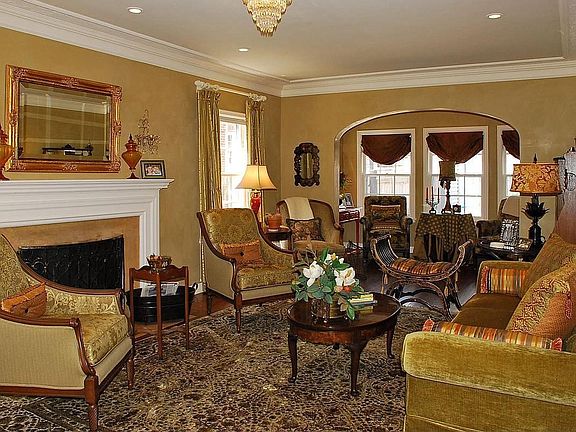 Large Gorgeous Living Room with a Sun Room Off the Back