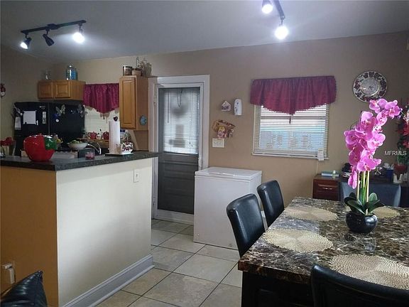 5th image of 7102 N Howard Ave