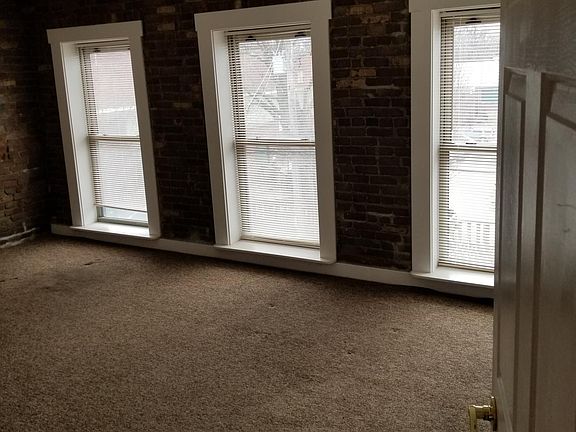 front room beautiful windows could be living room, bedroom, office.