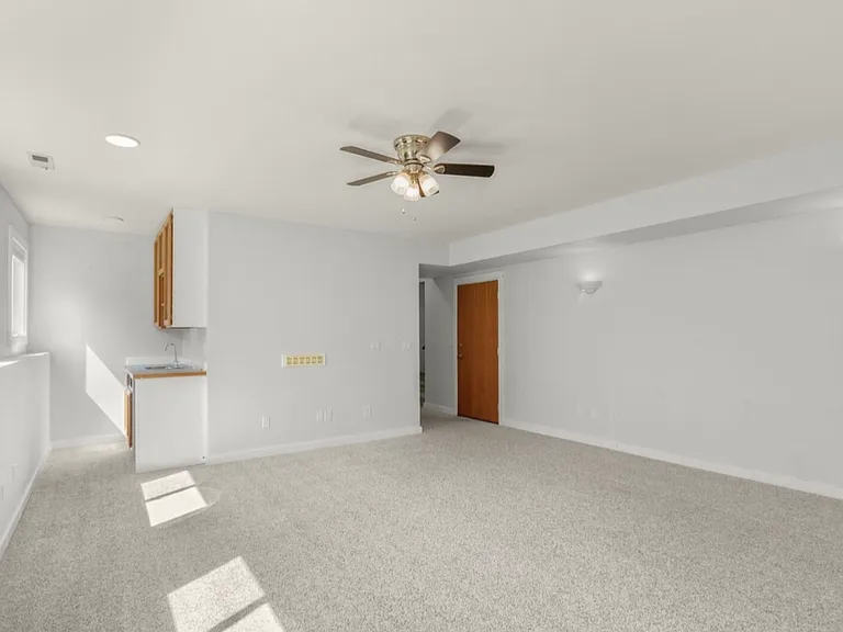 Downstairs family room. Located on the same floor as the extra guest room/office
