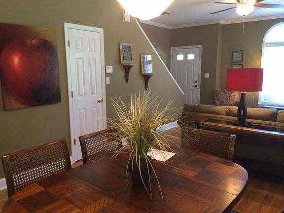 Additional storage located under the stairs.