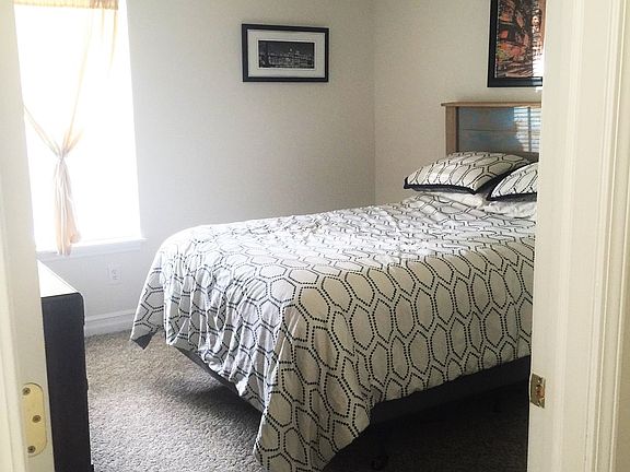 Bedroom w/ Queen Bed and Dresser