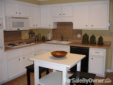 Kitchen : all appliances stay, ceramic tile backsplash, deep 9" double sink