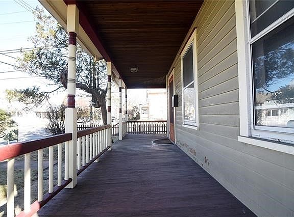 Wrap-around porch is the perfect place to sit and relax