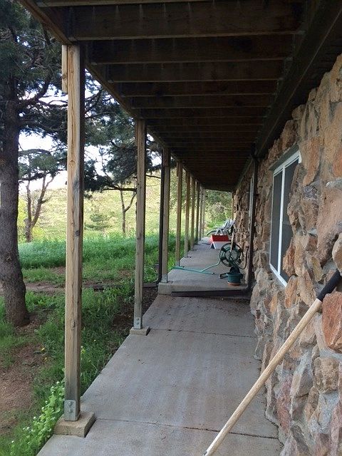 Porch is the length of the apt.
