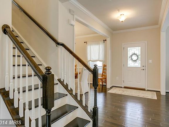 Gracious Wood Staircase with White Risers