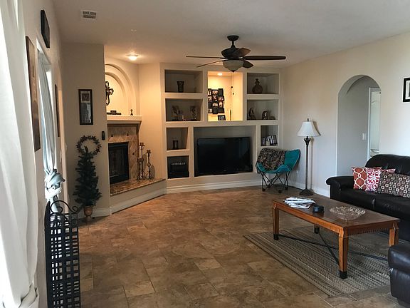 DEN W/FIREPLACE & BUILT IN'S