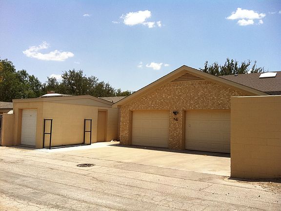Rear entry: oversized garage w detached motorcycle garage, greenhouse