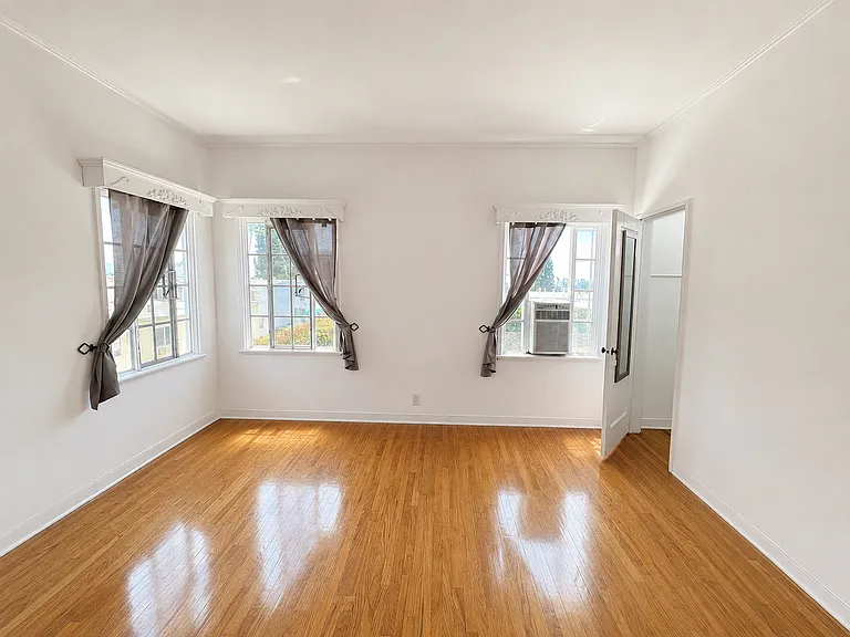 BEDROOM with THREE windows and very large closet