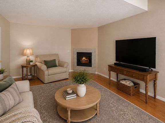 Living Room, view of fireplace, opposite sliding glass door.