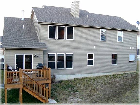 Cedar deck, backs to wood