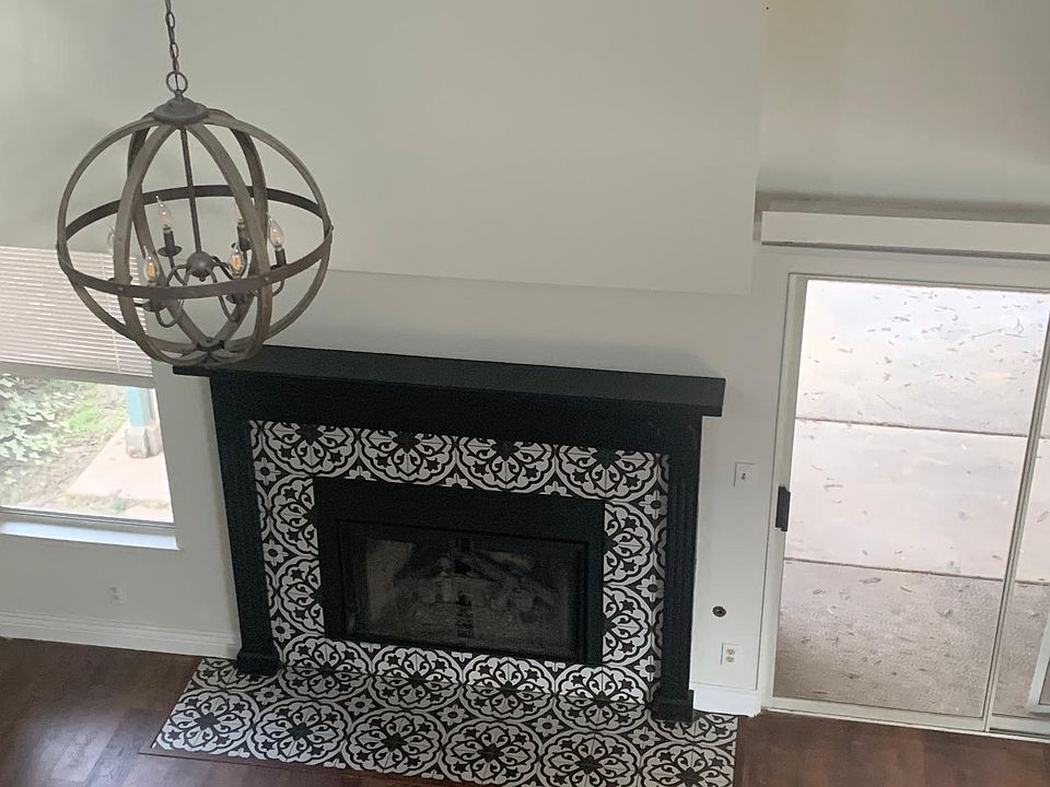 View from upstairs of beautiful new flooring and fireplace update!