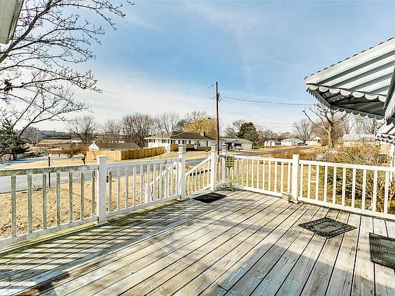 Look out off of the front deck onto the quiet street