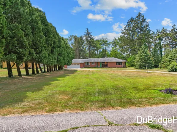 311 Honey Creek Ave SE, Ada, MI 49301