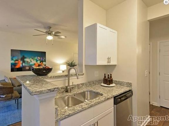 Granite countertops in the kitchen, bathroom, and desk