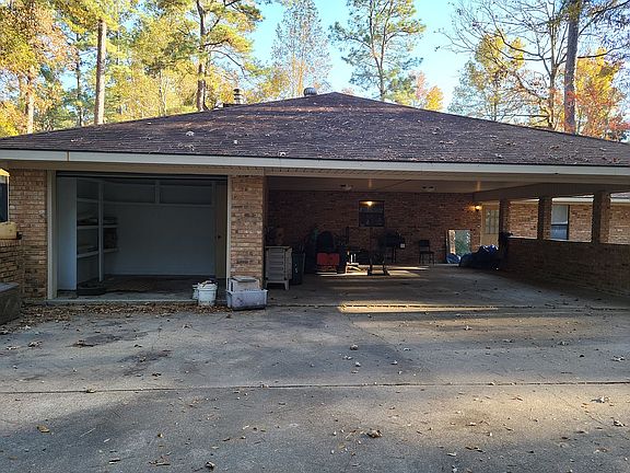 2 car carport w/ storage rooms